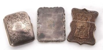 Mixed Lot: A Victorian card case of rectangular form with wavey edge and chased and engraved