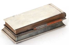 A Russian silver circa 1910 desk note book/paperweight of plain form, the hinged lid lifts to a