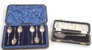 Mixed Lot: A part cased set comprising of six silver apostle teaspoons, (tongs mising), hallmarked
