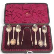 Cased set of Victorian silver teaspoons and sugar tongs, Old English pattern with bright cut