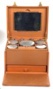 A vintage ladies leather leather travelling vanity set, part fitted with two trays and a single