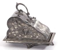 A large Victorian electro-plated Britannia metal cheese dish and cover, engraved with scrolls and