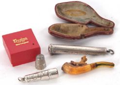 Mixed Lot: A hallmarked silver silver cheroot case, marks rubbed, a small Edwardian cheroot case,