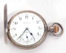 A silver Trenton Hunter pocket watch, hallmarked in the front and back of the case, it has a white