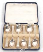 A cased set of six Edwardian Old English pattern silver teaspoons with bright cut decoration, London