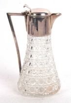 An Elizabeth II cut glass and silver mounted claret jug, the tapering hobnail cut body with a