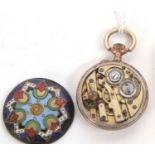 A fob pocket watch with a white enamel dial and Arabic numeral hour markers, it has a manually crown