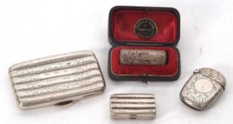 Mixed Lot: A cased late Victorian silver scent bottle of cylindrical form, chased and engraved all