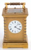 A John Hall & Co of Paris carriage clock, the clock features a key wound movement and four glass