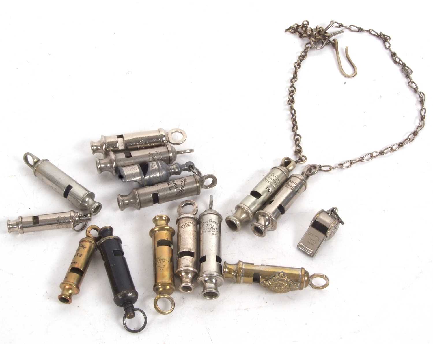 A group of fifteen various whistles to include two J Hudson & Co of Birmingham examples, City Policy
