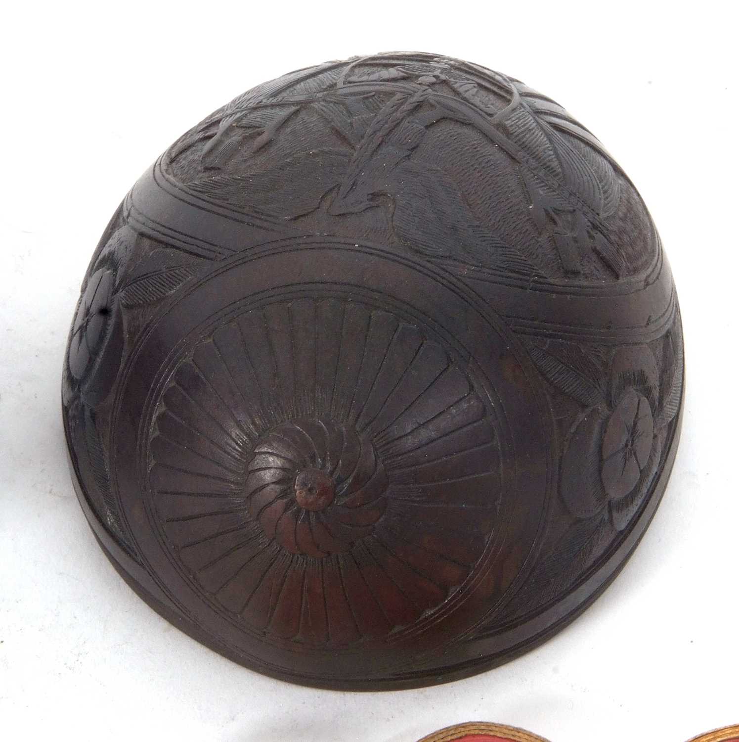 Two parts of a coconut shell, one antique with elaborate carved detail, the other later in date - Image 4 of 5