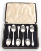 A cased set of George V silver Hanoverian and rat tail teaspoons, London 1931, makers mark for