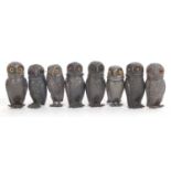 A group of eight pewter novelty screw top owl formed pepper shakers, 7cm tall (8)