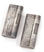 Two Dunhill silver plated lighters with textured finish, reference number D20103 and G76982 (2)