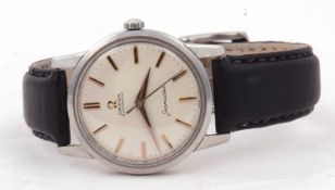A vintage Omega Seamaster automatic, the white dial features contrasting bronze coloured baton
