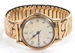 A 9ct gold cased gents Omega wristwatch, the watch features a crown wound movement, the inside of
