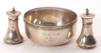 Mixed Lot: A George V silver bowl of circular form with pierced rim edge, having presentation