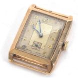 A 9ct gold cased gents tank style wristwatch, the watch has a manually crown wound movement of 15