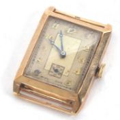 A 9ct gold cased gents tank style wristwatch, the watch has a manually crown wound movement of 15