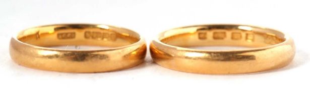 Two 22ct wedding bands: one hallmarked London 1928, size K, 4.1g, together with another hallmarked