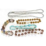 Five Murano glass bead necklaces, to include a long white and black bead necklace, three sparkled