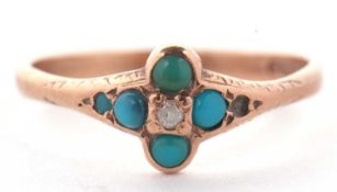 A 9ct turquoise and gemset ring, set with a quatrefoil of small turquoise cabochons and a white