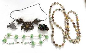 A large Sri Lankan multi-gemset necklace, set with citrines, garnets, and moonstones, all set in