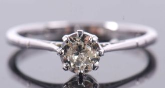 A diamond solitaire ring, the round brilliant cut diamond, estimated approx. 0.45cts, claw mounted