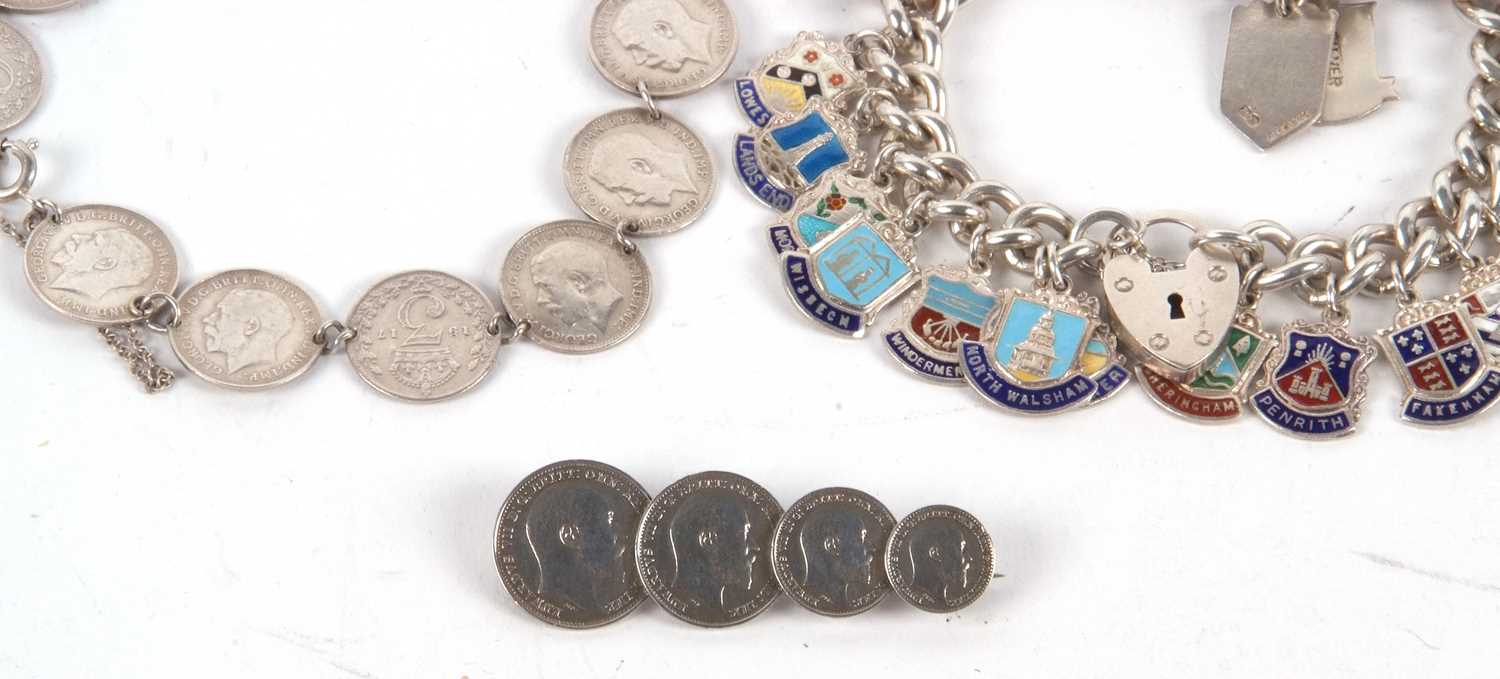A threepence coin bracelet and a coin brooch, 23g, together with a silver and enamel charm bracelet, - Image 4 of 4