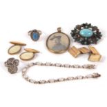A quantity of mixed jewellery to include a silver and CZ bracelet, two pairs of cufflinks, an Art