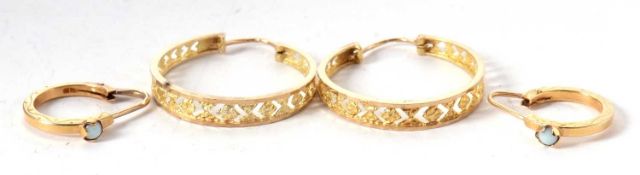 A pair of 9ct textured pierced hoop earrings, hallmarked London 1977, 2.9g, together with a pair