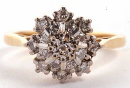 An 18ct three tier diamond cluster ring, set with round brilliant cut diamonds, all in white metal