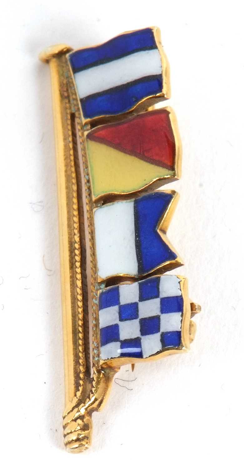A 9ct naval flag brooch, set with four flags spelling 'Joan', hallmarked to reverse, Birmingham