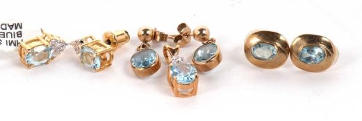 A quantity of topaz jewellery to include a pair of 9ct oval topaz drop earrings, a pair of 9ct