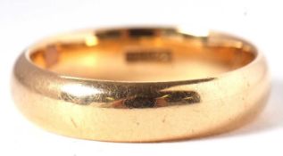 A wedding band, indistinctly stamped 22, size P-Q, 6.6g