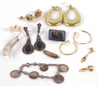 A quantity of mixed costume jewellery to include a silver leaf brooch, a coin bracelet, marcasite,