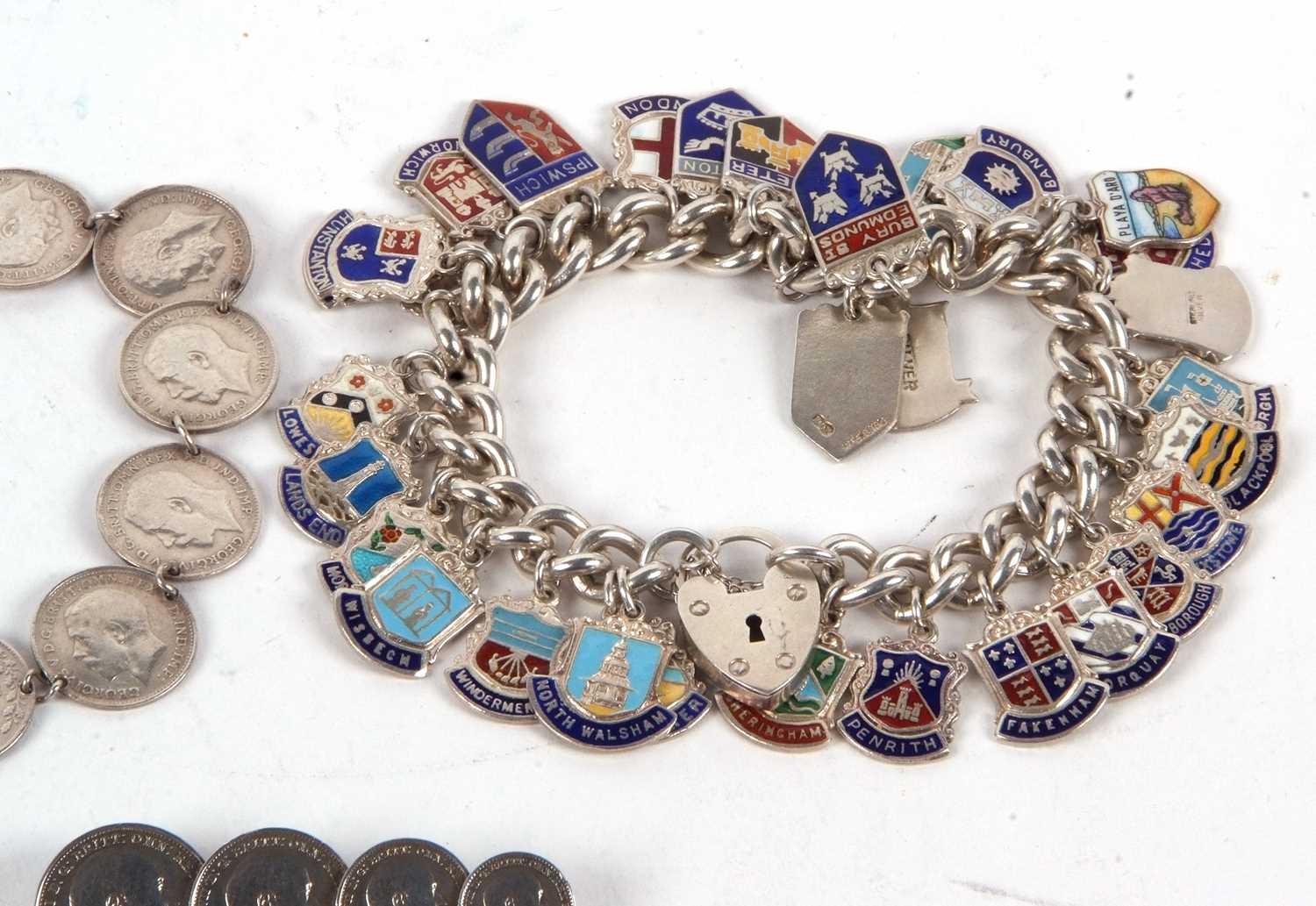 A threepence coin bracelet and a coin brooch, 23g, together with a silver and enamel charm bracelet, - Image 3 of 4