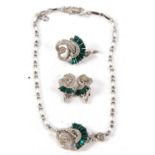 A Ciro green and white paste suite, comprising of a necklace of a semi-circle of baguette cut