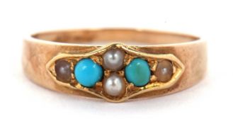 A turquoise and split pearl ring, set to centre with two split pearls with a turquoise cabochon to