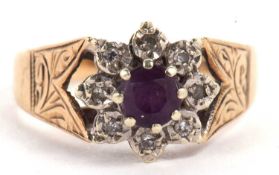 A 9ct amethyst and diamond ring, the central round amethyst, surrounded by illusion set diamonds,
