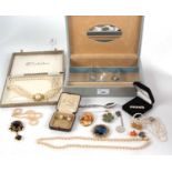A pale grey jewellery box and contents to include a three strand faux pearl choker, brooches,