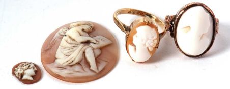 Two 9ct shell cameo rings, (6.2g) together with two unmounted oval shell cameo's (a/f), (4)
