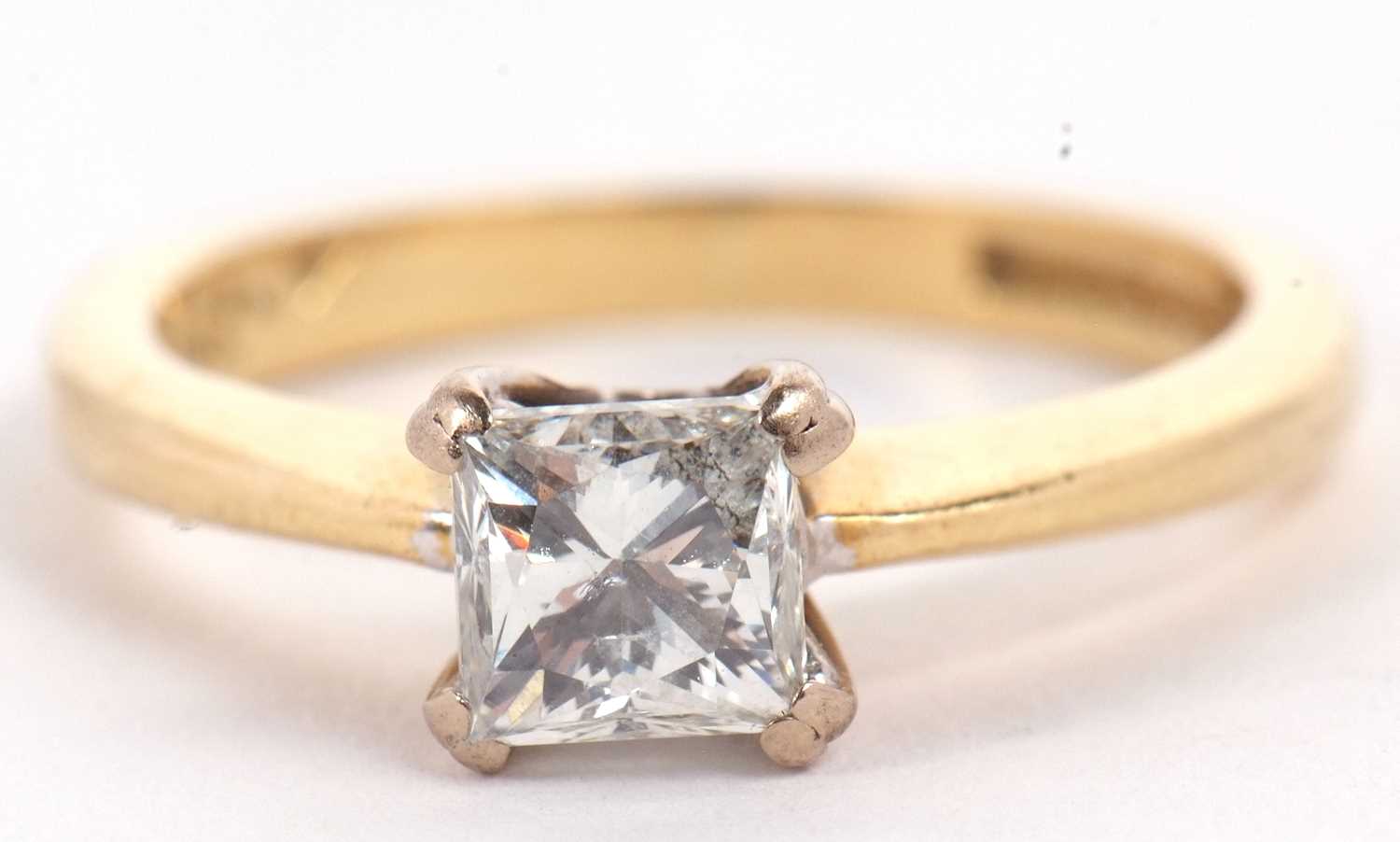 An 18ct princess cut diamond ring, wieght approx. 0.75cts, in a four claw mount to a plain band - Image 3 of 11