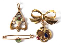 A quantity of gold and gemset jewellery to include a 9ct sapphire and ruby bow brooch, hallmarked