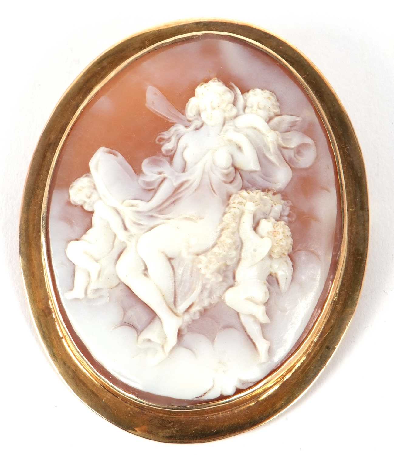 An oval shell cameo of a classical maiden and three cherubs, collet mounted with pin to reverse, - Image 2 of 3