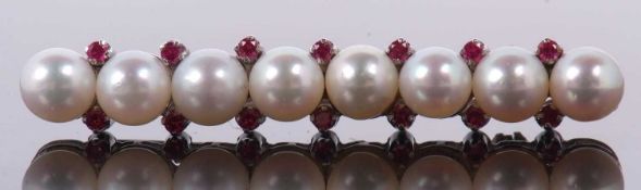A cultured pearl and synthetic ruby bar brooch, the eight cultured pearls, each approx 5.5mm