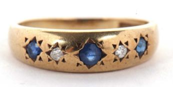 A 9ct sapphire and diamond ring, the three round sapphires interspaced with small round diamonds,