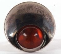 A Danish silver and amber ring by Niels Erik From, the round silver saucer shape top, 2cm