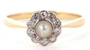 An 18ct cultured pearl and diamond cluster ring, the central cultured pearl surrounded by round