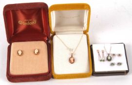A quantity of gemset jewellery to include a 9ct opal and emerald pendant, three pairs of unmarked